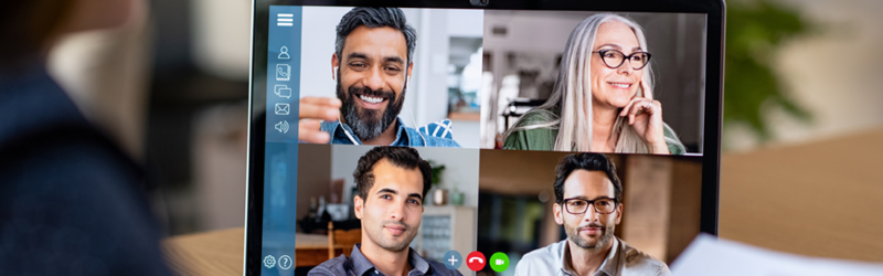 Video call with four people on a computer screen