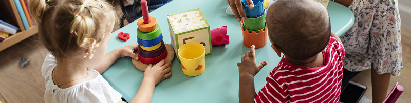 Children playing at a table